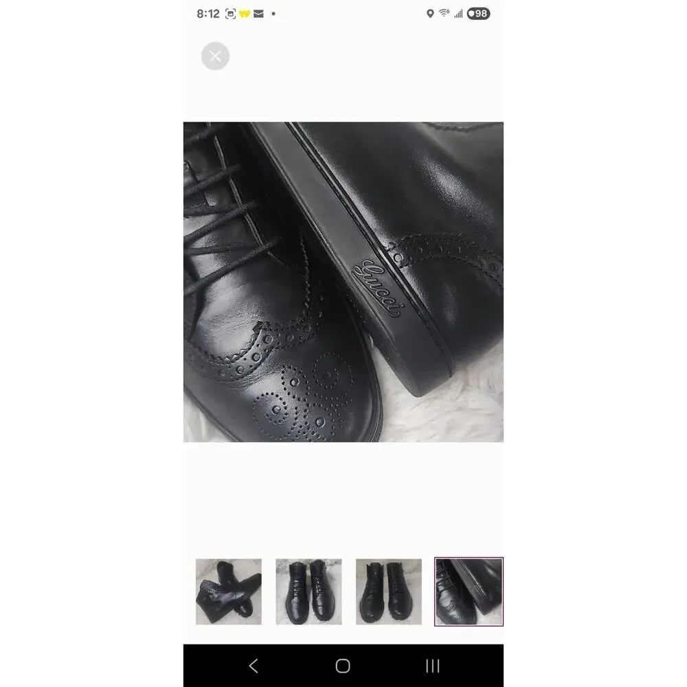 gucci black leather Laceup sneakers, with GG logo and cherry line on the side.